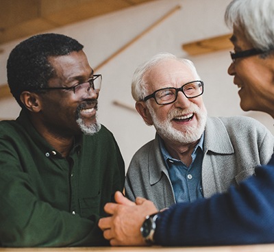 Group of senior men smiling together