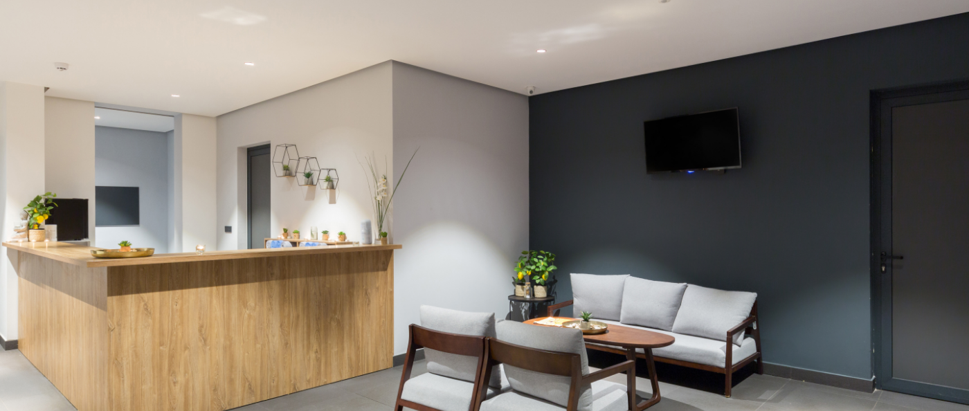 Comfy white chairs in reception area