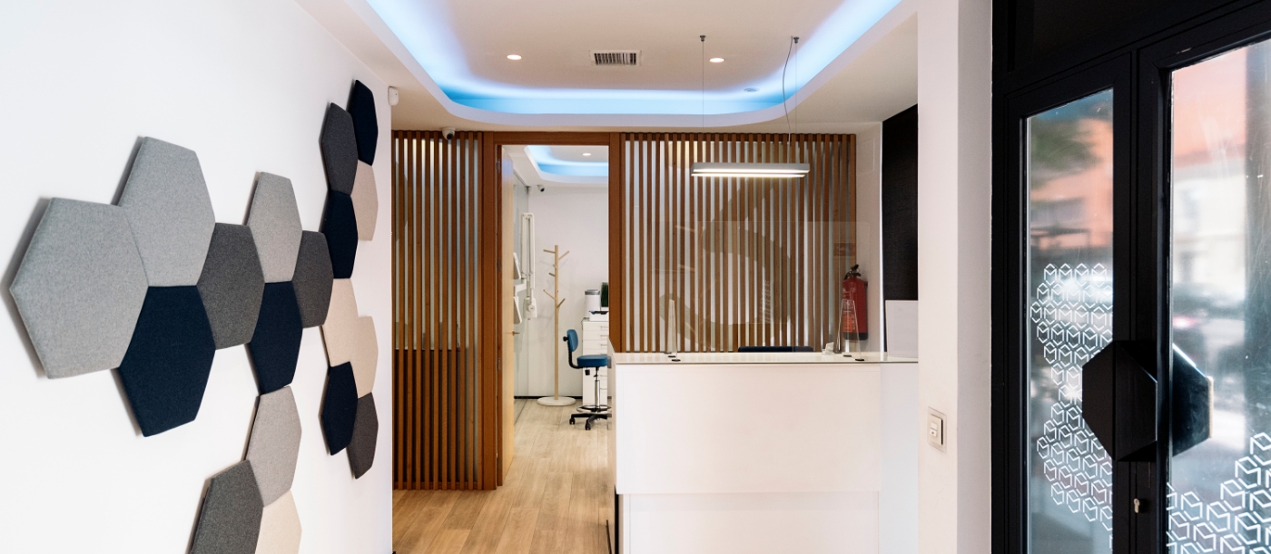 Front desk and hallway in Pleasant Dental