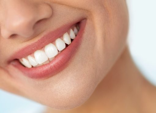 Close up of smile with straight white teeth